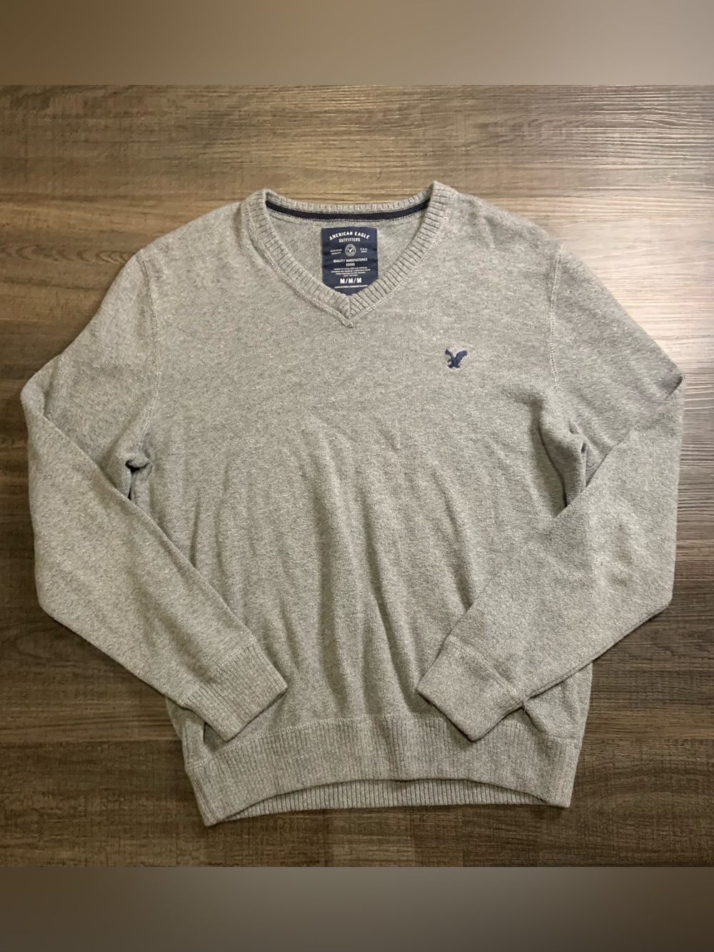 American Eagle Outfitters Light Gray V-Neck Sweater with Navy Logo